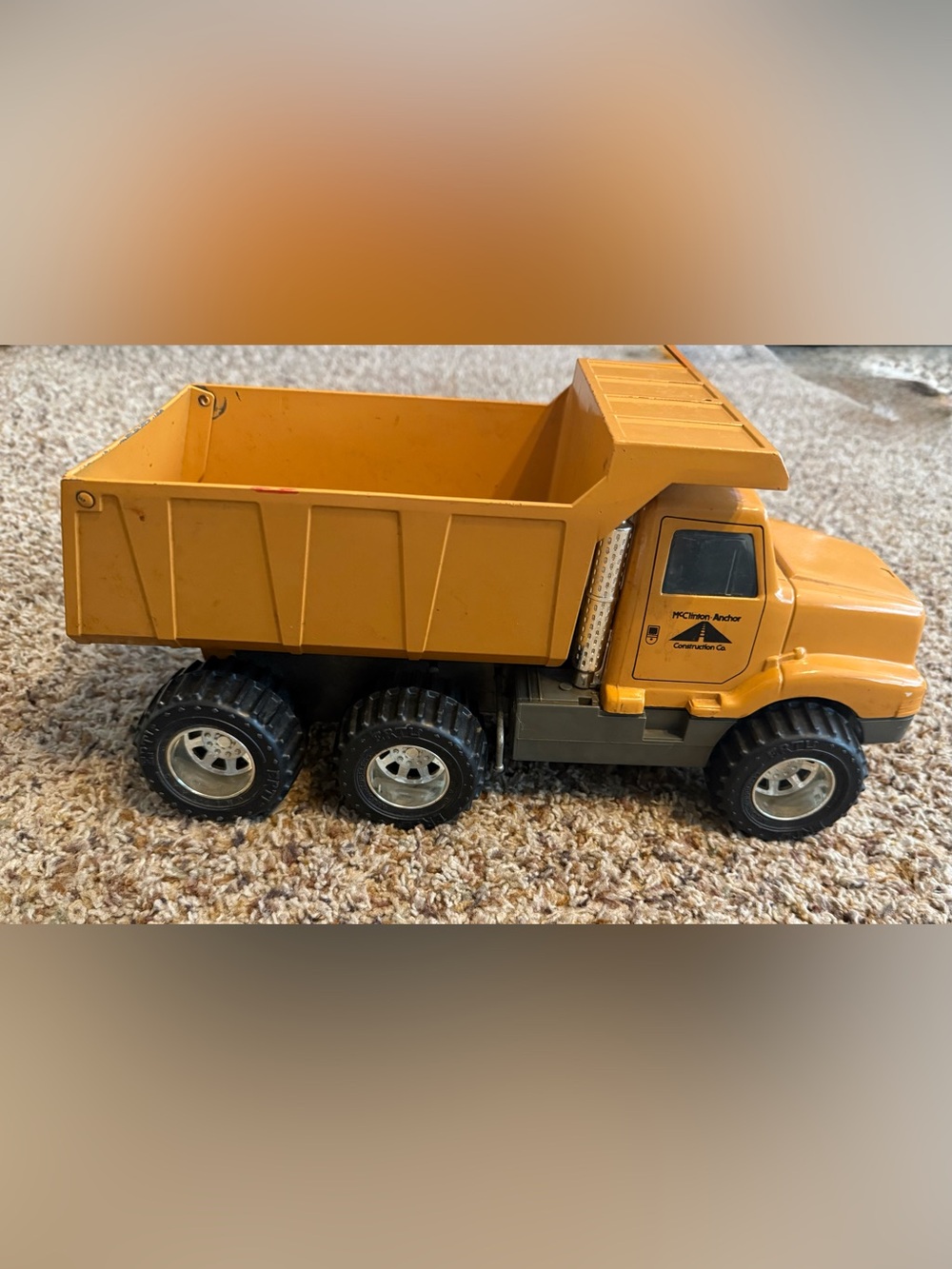 Yellow Dump Truck Kids Toy by ERTL